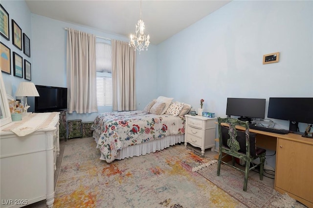 bedroom featuring a chandelier