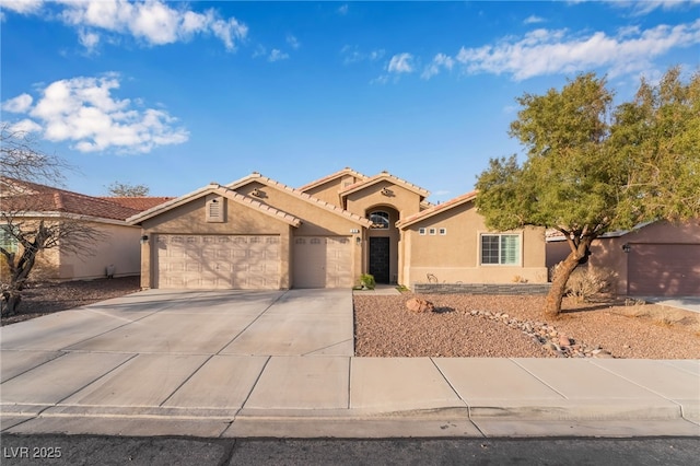 view of front of property featuring a garage