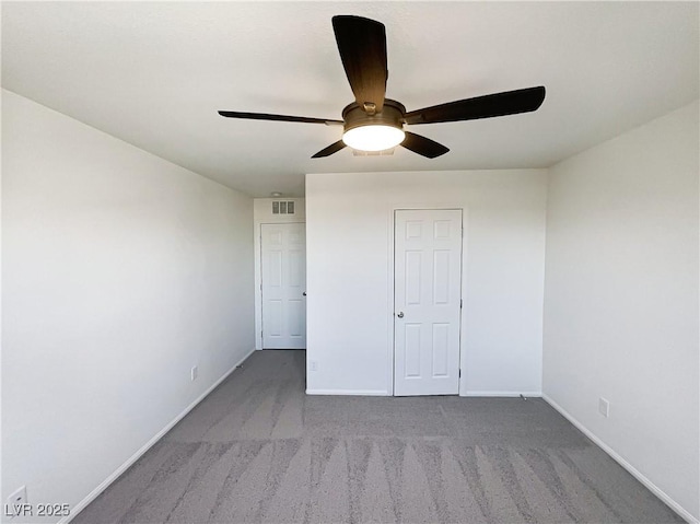 unfurnished bedroom with light carpet and ceiling fan