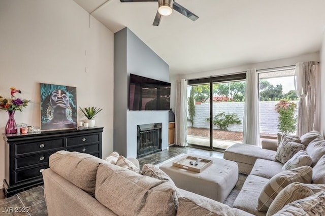 living room with high vaulted ceiling and ceiling fan