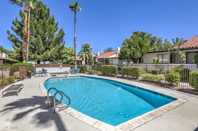 view of pool featuring a patio area