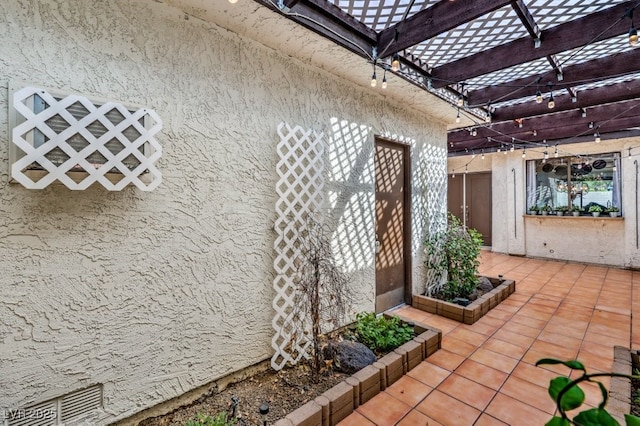 view of patio / terrace featuring a pergola