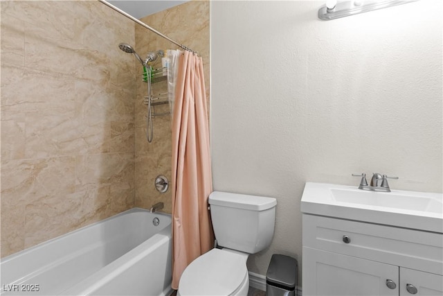 full bathroom featuring shower / bath combination with curtain, vanity, and toilet