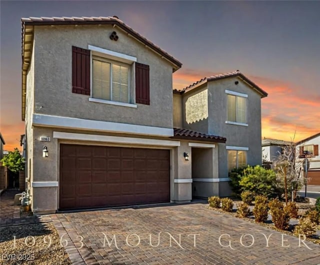 view of front of home with a garage