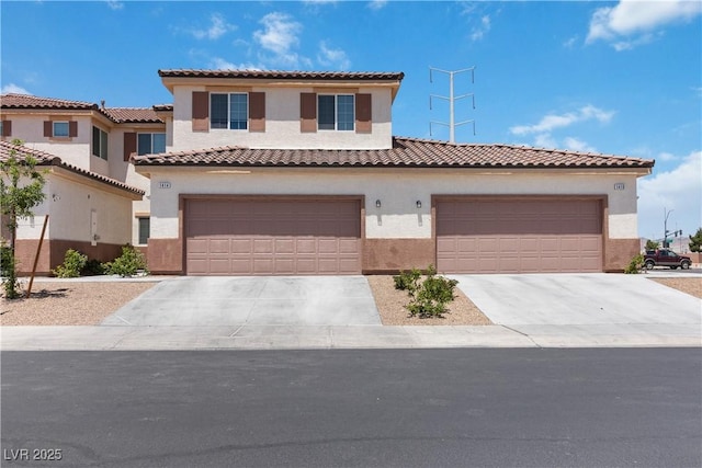 1410 Pink Dawn Dr, Henderson, NV 89014 - mediterranean / spanish home featuring a garage