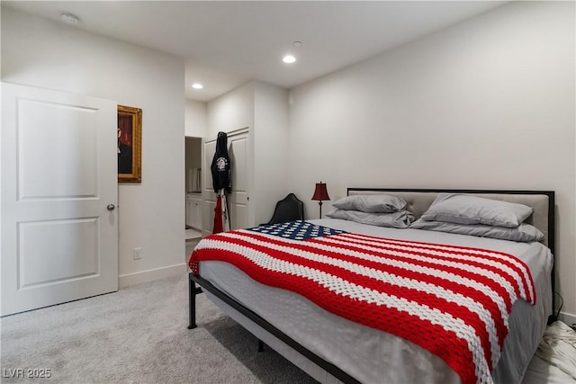 bedroom featuring light colored carpet