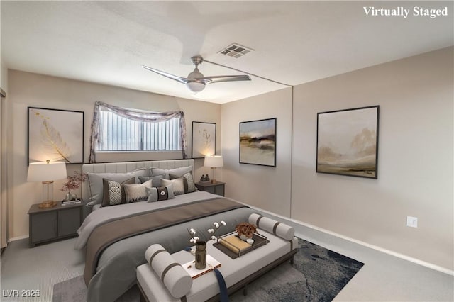 bedroom with visible vents, baseboards, a ceiling fan, and carpet floors