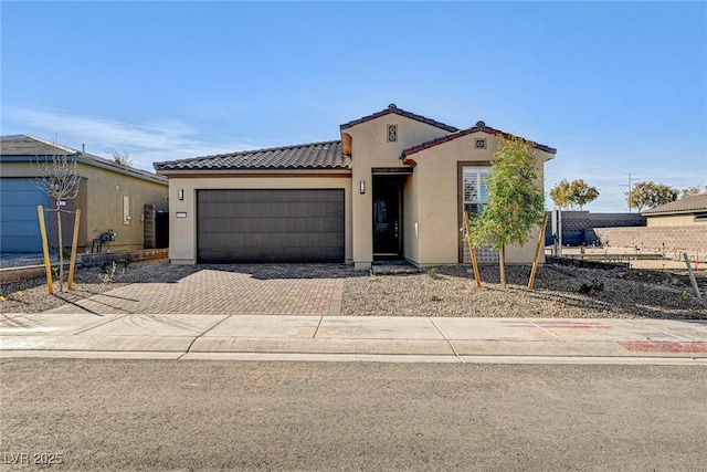 view of front of property featuring a garage