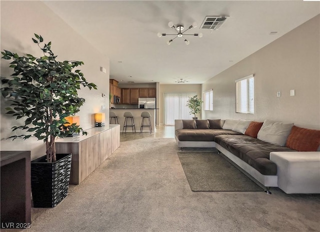 living room featuring visible vents