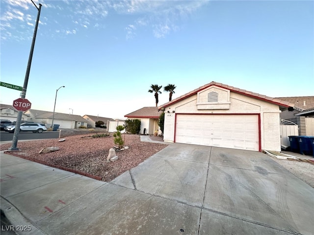 ranch-style home with a garage