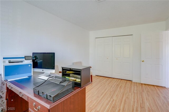 office area with light wood-type flooring