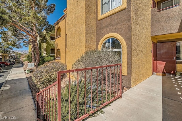 exterior space with stucco siding