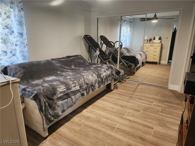 7950 W Flamingo Rd Unit 1081, Las Vegas, NV 89147 - bedroom featuring wood finished floors and a closet