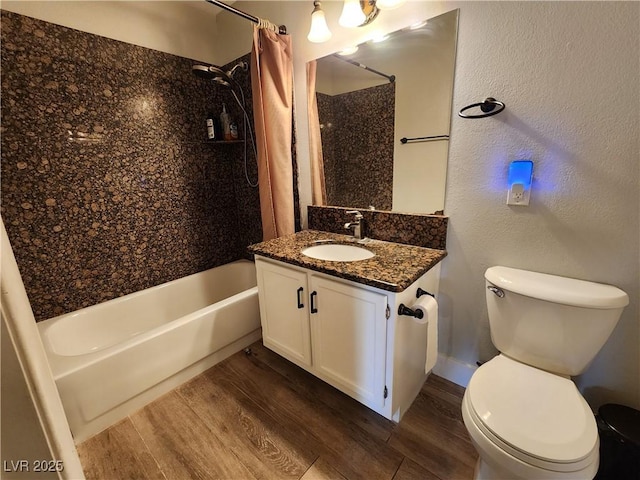 7950 W Flamingo Rd Unit 1081, Las Vegas, NV 89147 - full bath featuring shower / bath combination with curtain, vanity, and wood finished floors