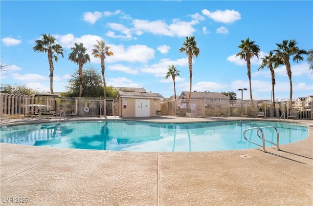 view of swimming pool featuring a patio area