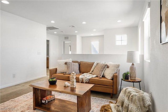 living room featuring light carpet