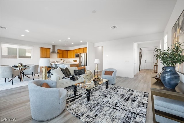 living room featuring light hardwood / wood-style floors