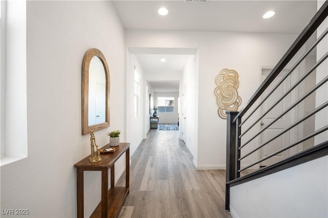 hall featuring light wood-type flooring