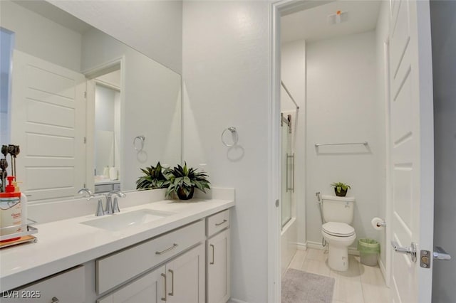 full bathroom with vanity, tub / shower combination, and toilet