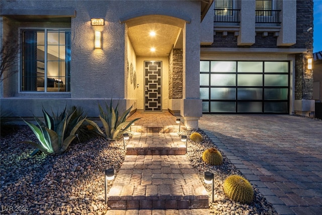 doorway to property featuring a garage