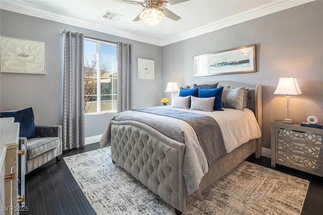 bedroom with crown molding, ceiling fan, and dark hardwood / wood-style floors