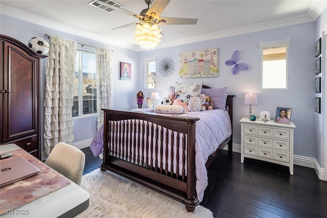 bedroom featuring ornamental molding, ceiling fan, and dark hardwood / wood-style flooring