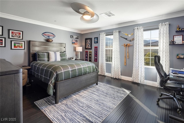 bedroom featuring multiple windows, ornamental molding, and dark hardwood / wood-style floors