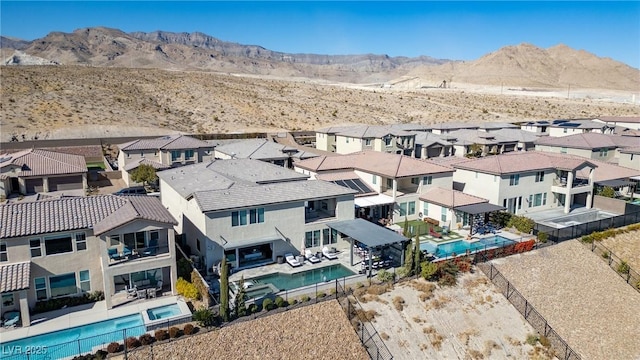 drone / aerial view featuring a mountain view