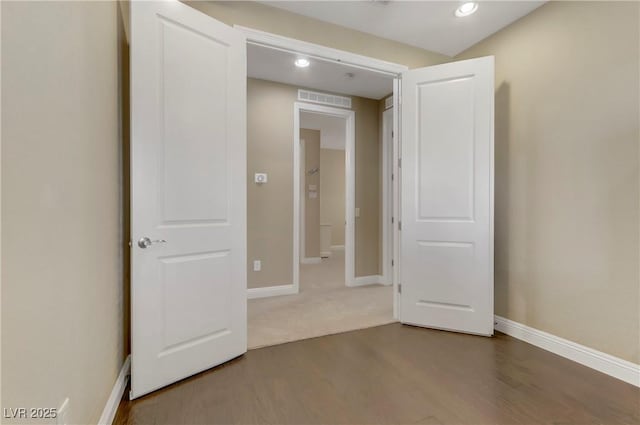 interior space with hardwood / wood-style floors