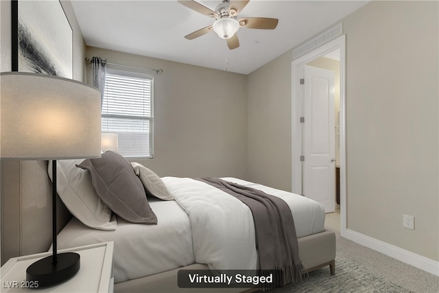 carpeted bedroom with ceiling fan