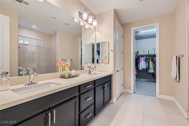 bathroom with vanity and tile patterned floors