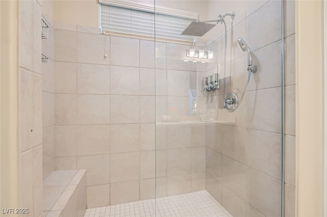 bathroom with tiled shower