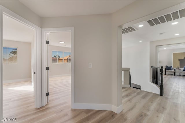 hallway featuring light hardwood / wood-style floors