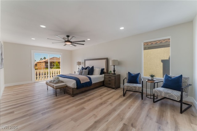 bedroom featuring access to exterior, light hardwood / wood-style floors, and ceiling fan