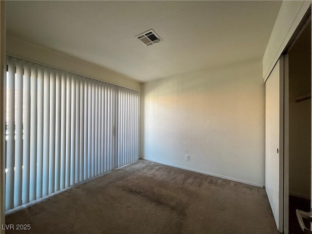 spare room with carpet flooring