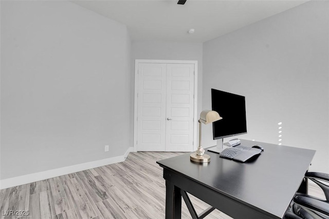 home office featuring light hardwood / wood-style flooring