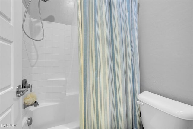 bathroom with shower / bathtub combination with curtain and toilet