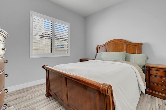 bedroom with light hardwood / wood-style flooring