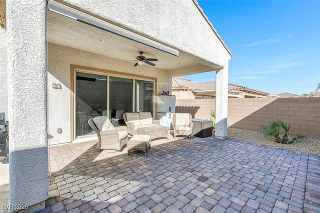 view of patio with ceiling fan