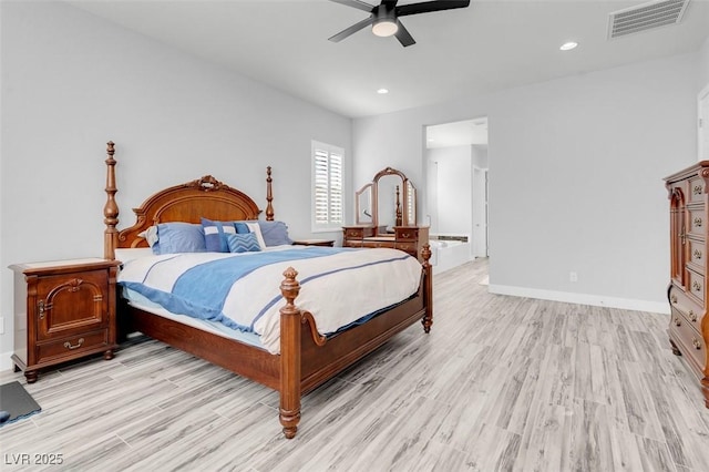 bedroom with light hardwood / wood-style floors and ceiling fan