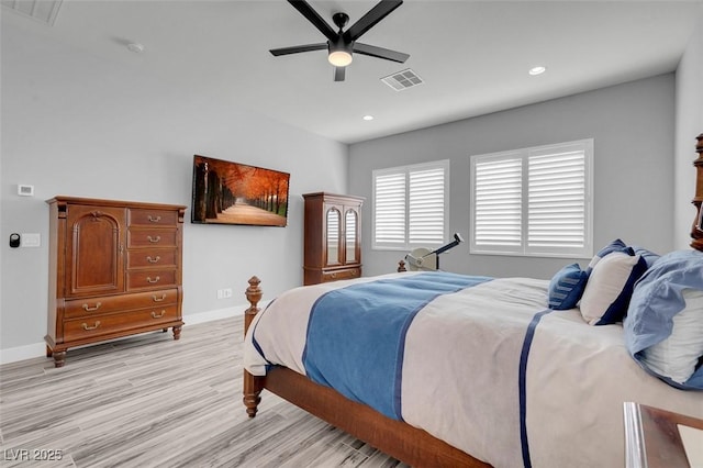 bedroom featuring light hardwood / wood-style floors and ceiling fan