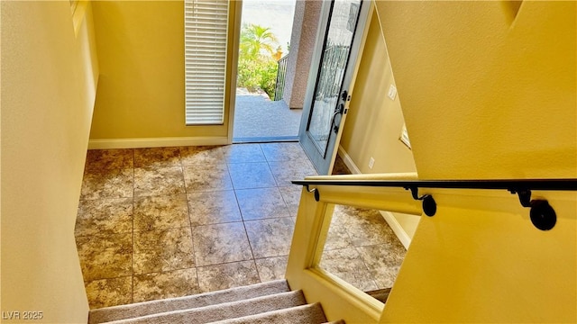 interior space with tile patterned floors