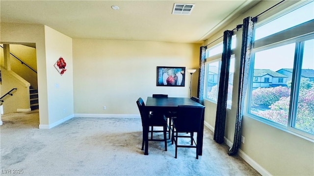 view of carpeted dining room