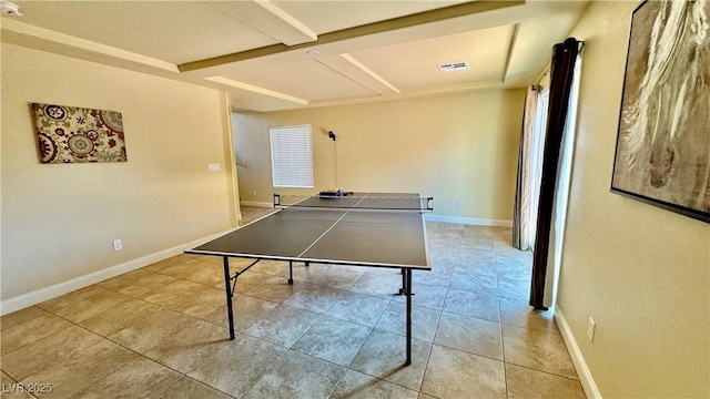 recreation room with a healthy amount of sunlight and light tile patterned floors