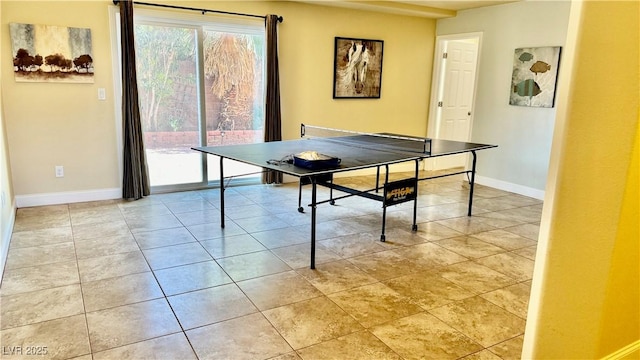 recreation room with light tile patterned flooring