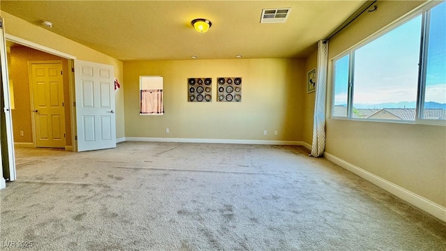 view of carpeted spare room