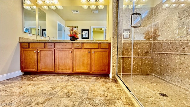 bathroom featuring vanity and walk in shower