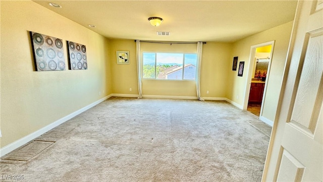 empty room with carpet floors