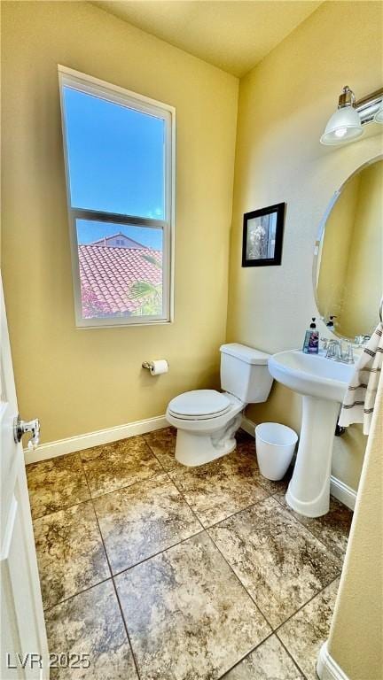 bathroom featuring toilet