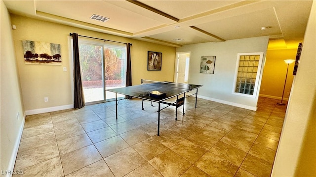 recreation room featuring coffered ceiling and light tile patterned floors